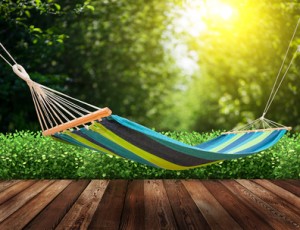 Relaxing on hammock in garden